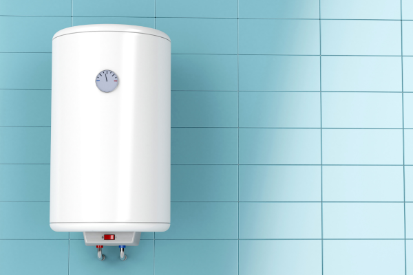 A small cute white water tank on a robin blue tiled wall. Hot Water Tank Replacement in Delta